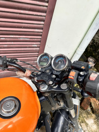 Orange Royal Enfield Thunderbird X 500