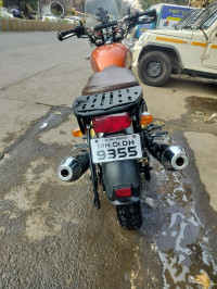 Orange Royal Enfield Interceptor 650 Twin