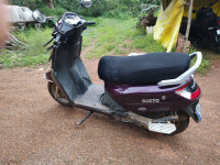Purple Mahindra Gusto