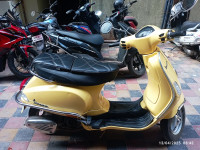 Yellow Vespa 125