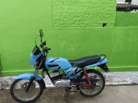 Blue Suzuki MAX 100R