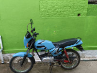 Blue Suzuki MAX 100R