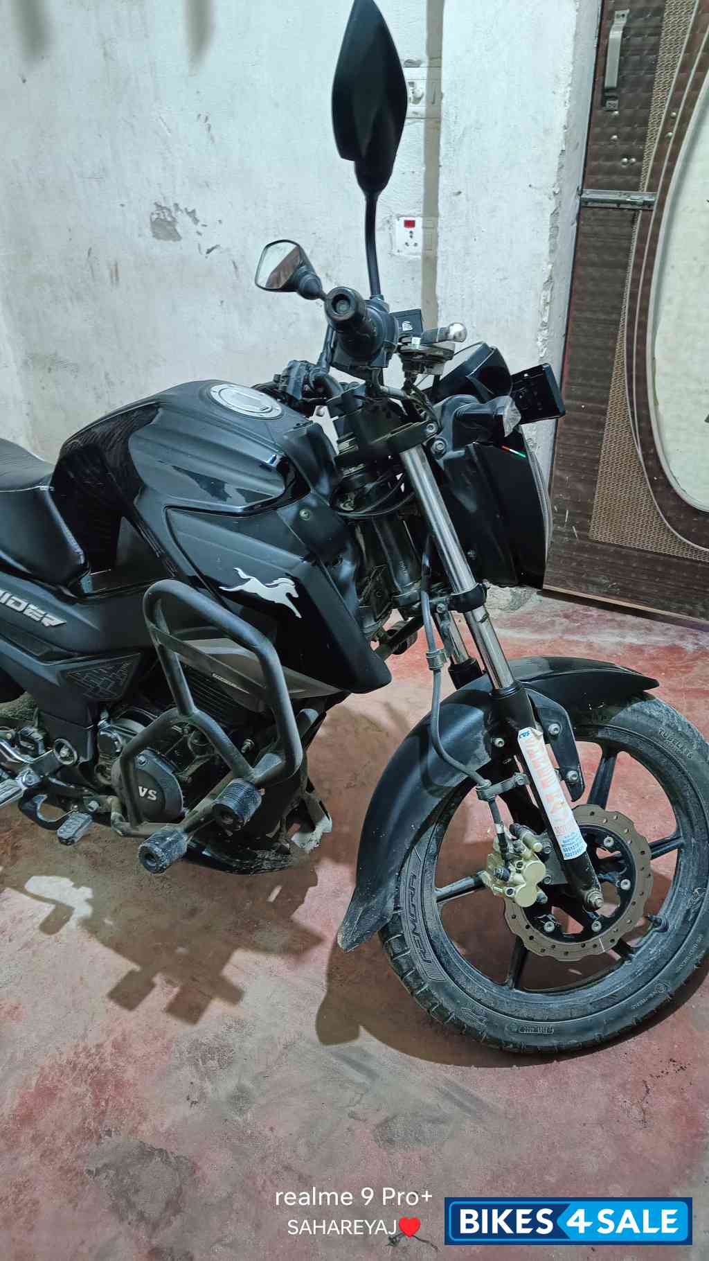 Black TVS Raider SX