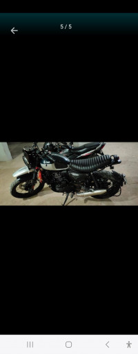 Mean Green Yezdi Scrambler Dual Tone