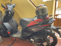 Black Aprilia SR 150 Carbon