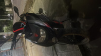 Black Aprilia SR 150 Carbon