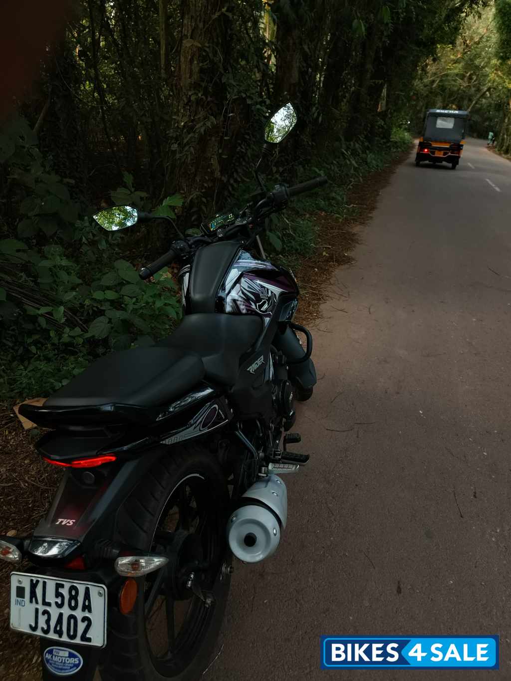 Black TVS Raider 125 Marvel Super Squad Edition