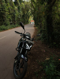 Black TVS Raider 125 Marvel Super Squad Edition