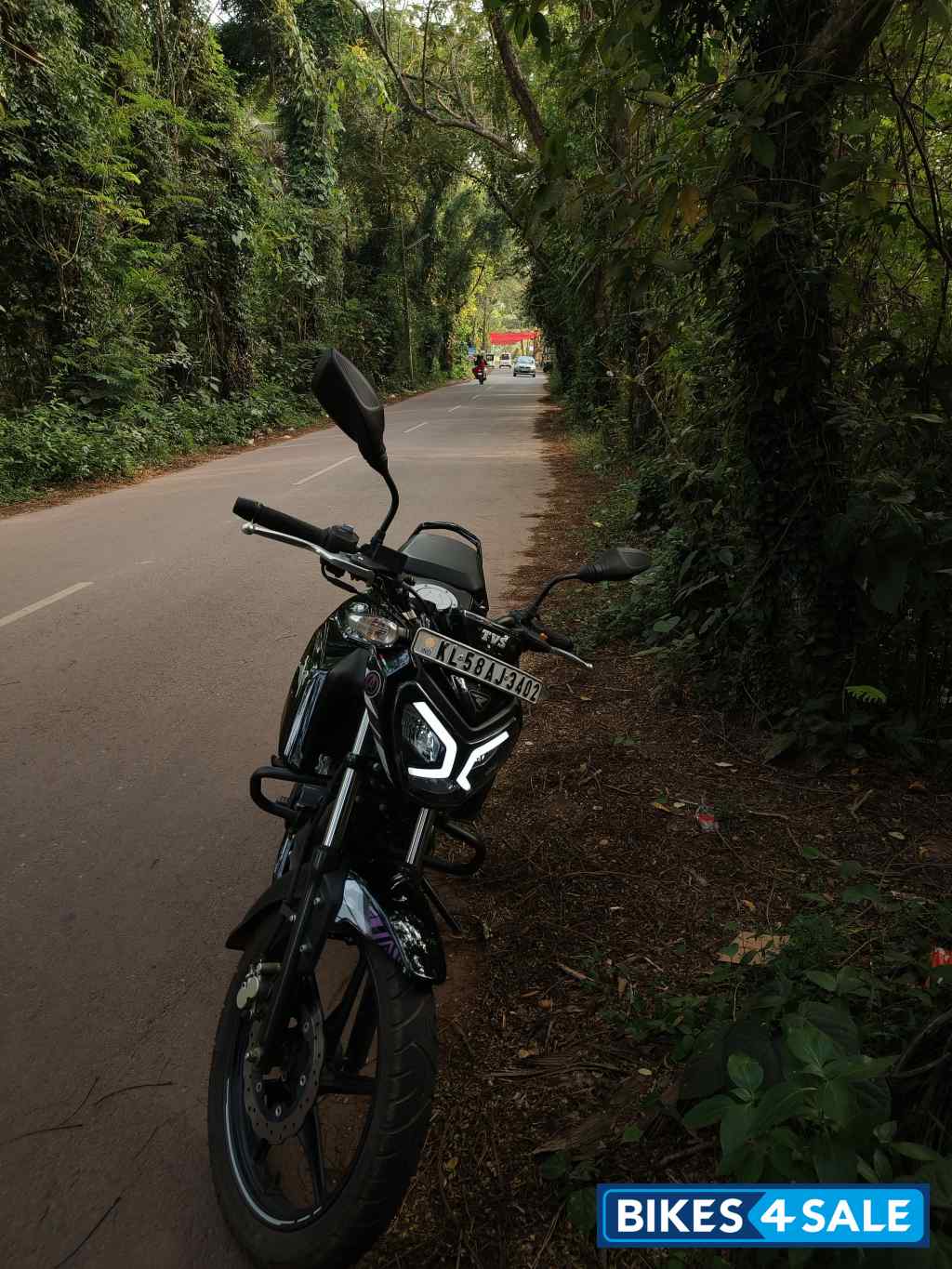 Black TVS Raider 125 Marvel Super Squad Edition