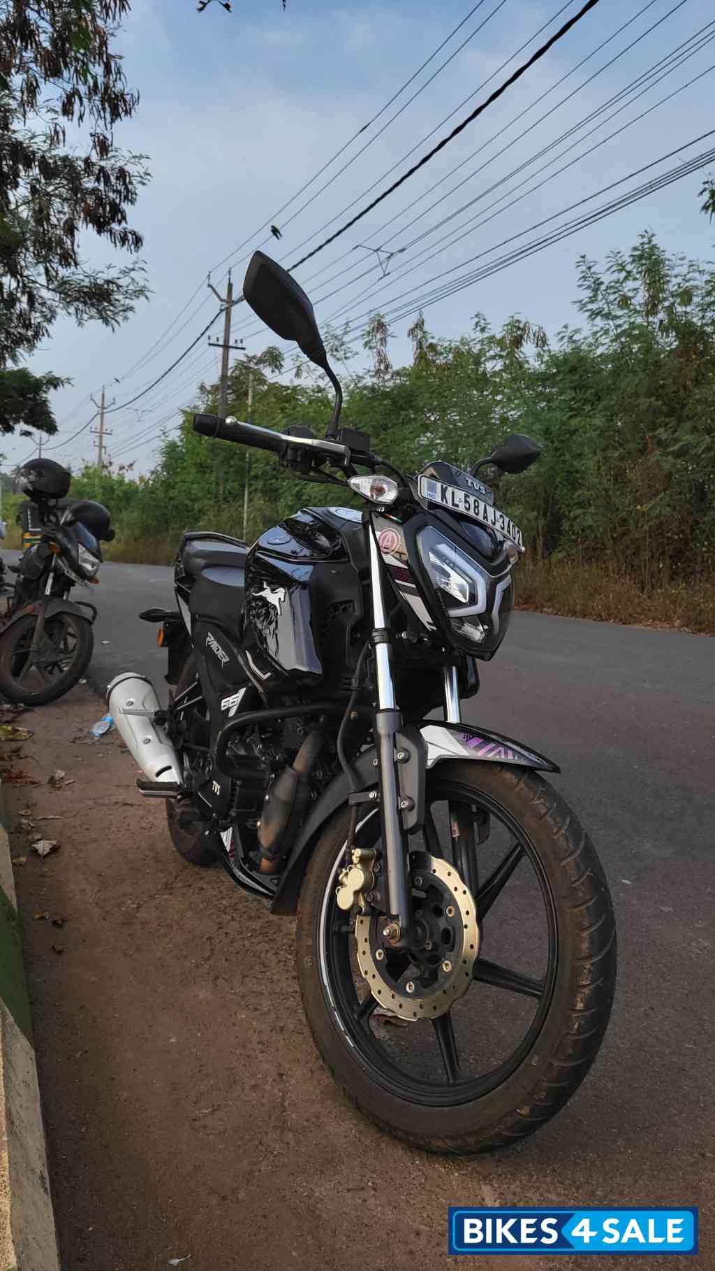 Black TVS Raider 125 Marvel Super Squad Edition