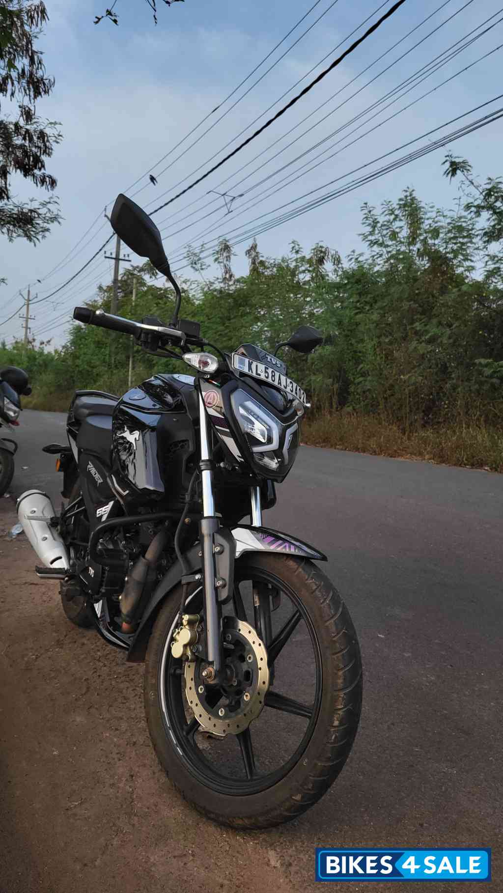 Black TVS Raider 125 Marvel Super Squad Edition