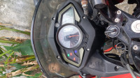 Red Bajaj Pulsar AS 150