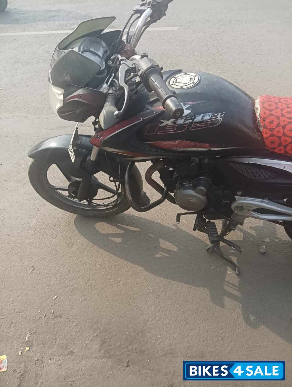 Black Bajaj XCD 135 DTS-Si