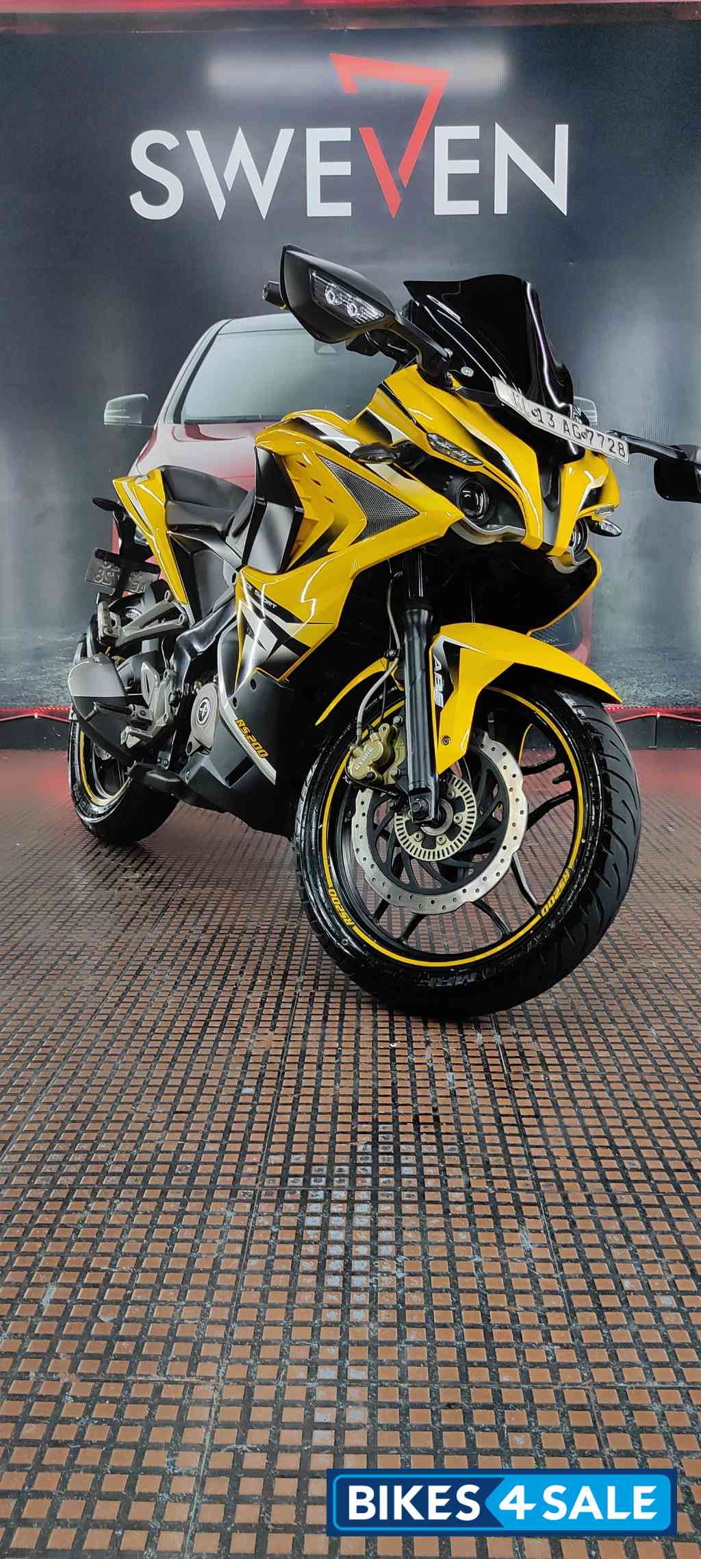 Yellow Bajaj Pulsar RS 200 ABS