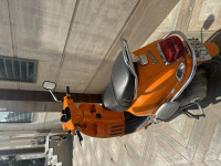 Orange Vespa S 125