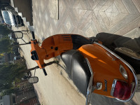 Orange Vespa S 125