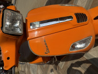 Orange Vespa S 125
