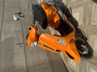 Orange Vespa S 125