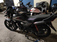 Silver And Red Honda CB Shine