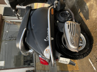 Matte Black Vespa ZX 125