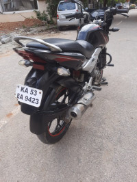 Red Bajaj Discover 125 ST