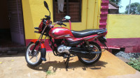 Cherry Red Bajaj Platina 100 ES