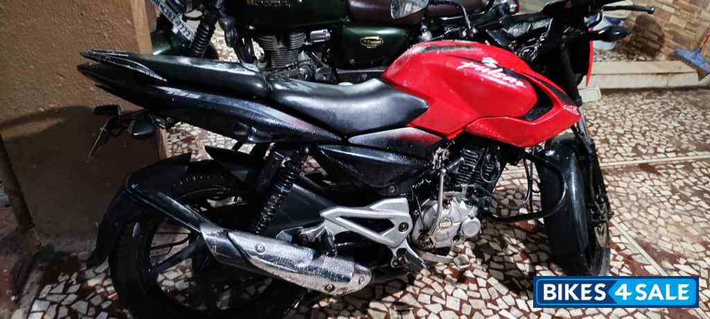 Red Bajaj Pulsar 135LS