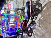 Red Bajaj Discover 100T