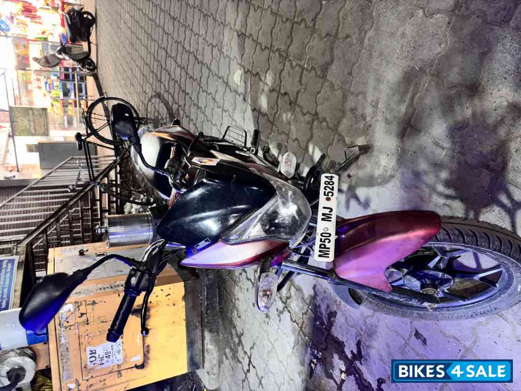 Red Bajaj Discover 100T