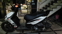 White Aprilia SR 125