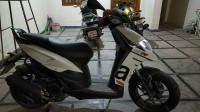 White Aprilia SR 125