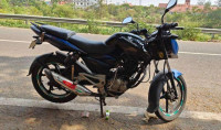 Blue/black Bajaj Pulsar 135LS