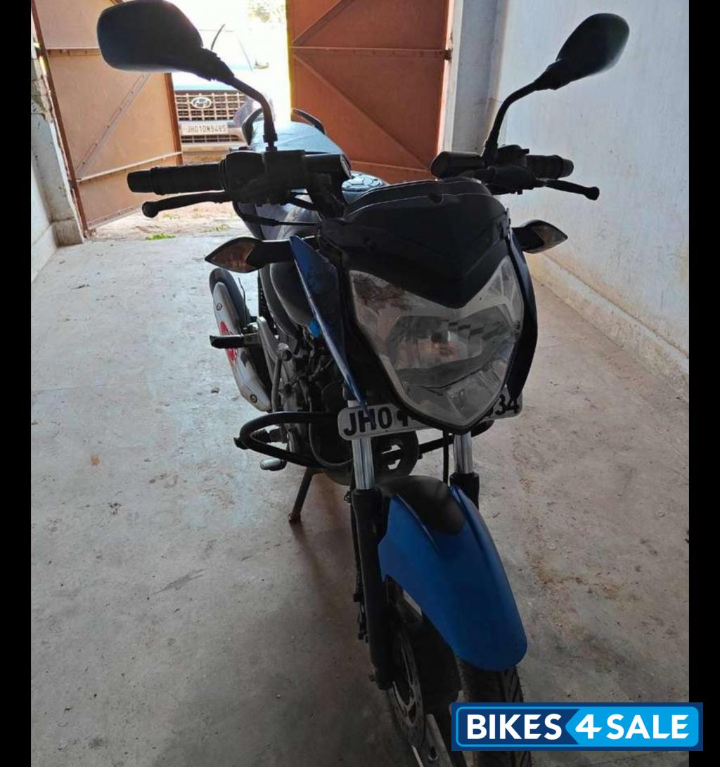 Blue/black Bajaj Pulsar 135LS