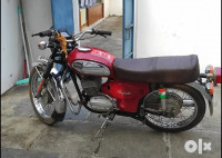 Red And Silver Yamaha Rajdoot