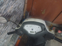 White Suzuki Access 125