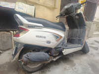 Milky White Mahindra Gusto