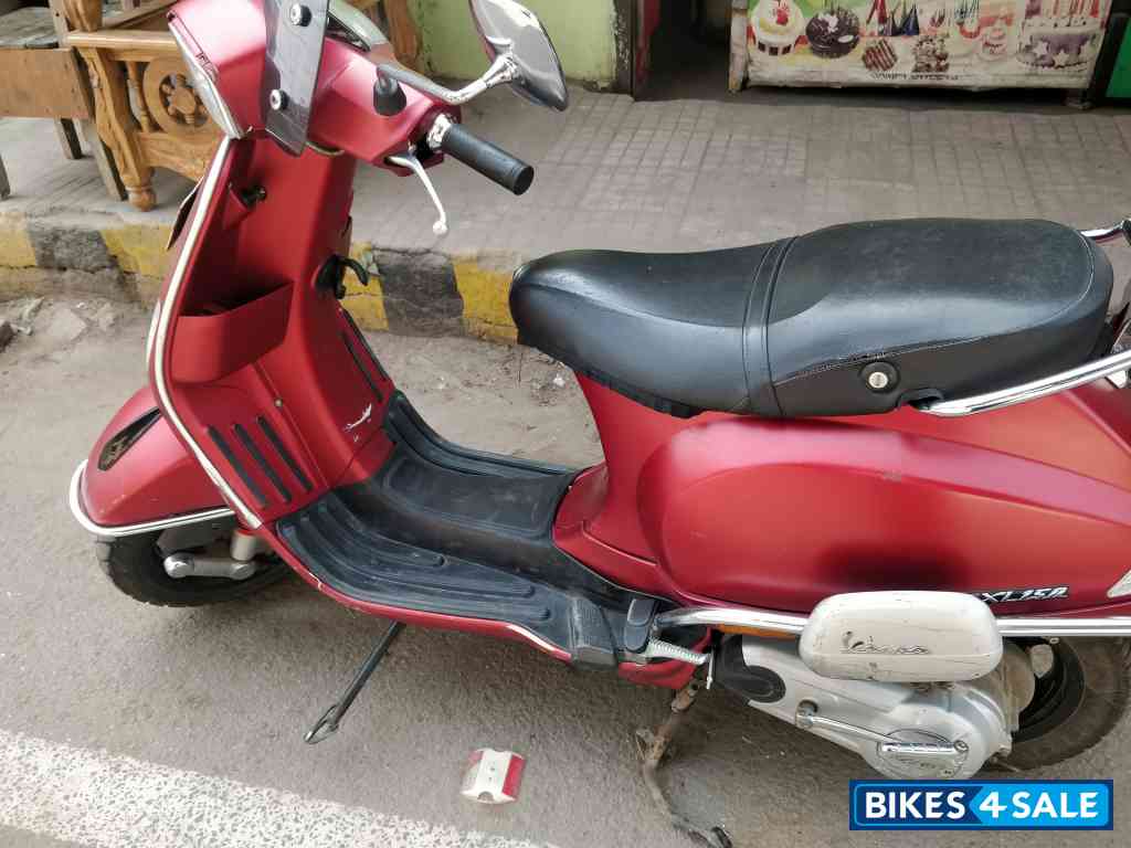 Maroon Vespa SXL 150