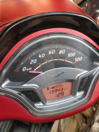 Maroon Vespa SXL 150