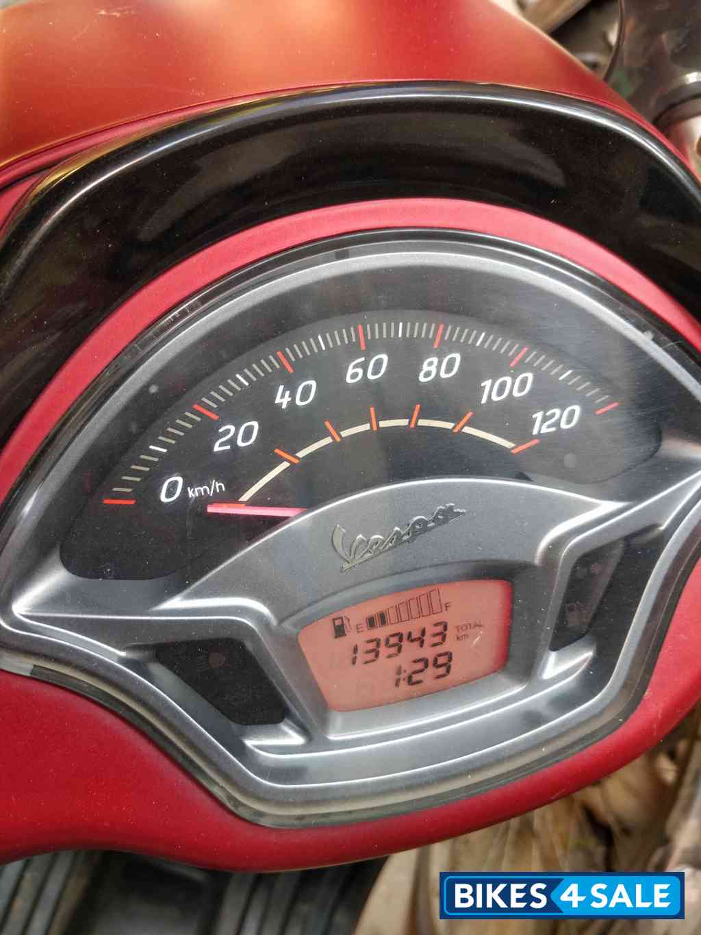 Maroon Vespa SXL 150