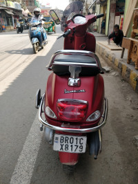 Maroon Vespa SXL 150