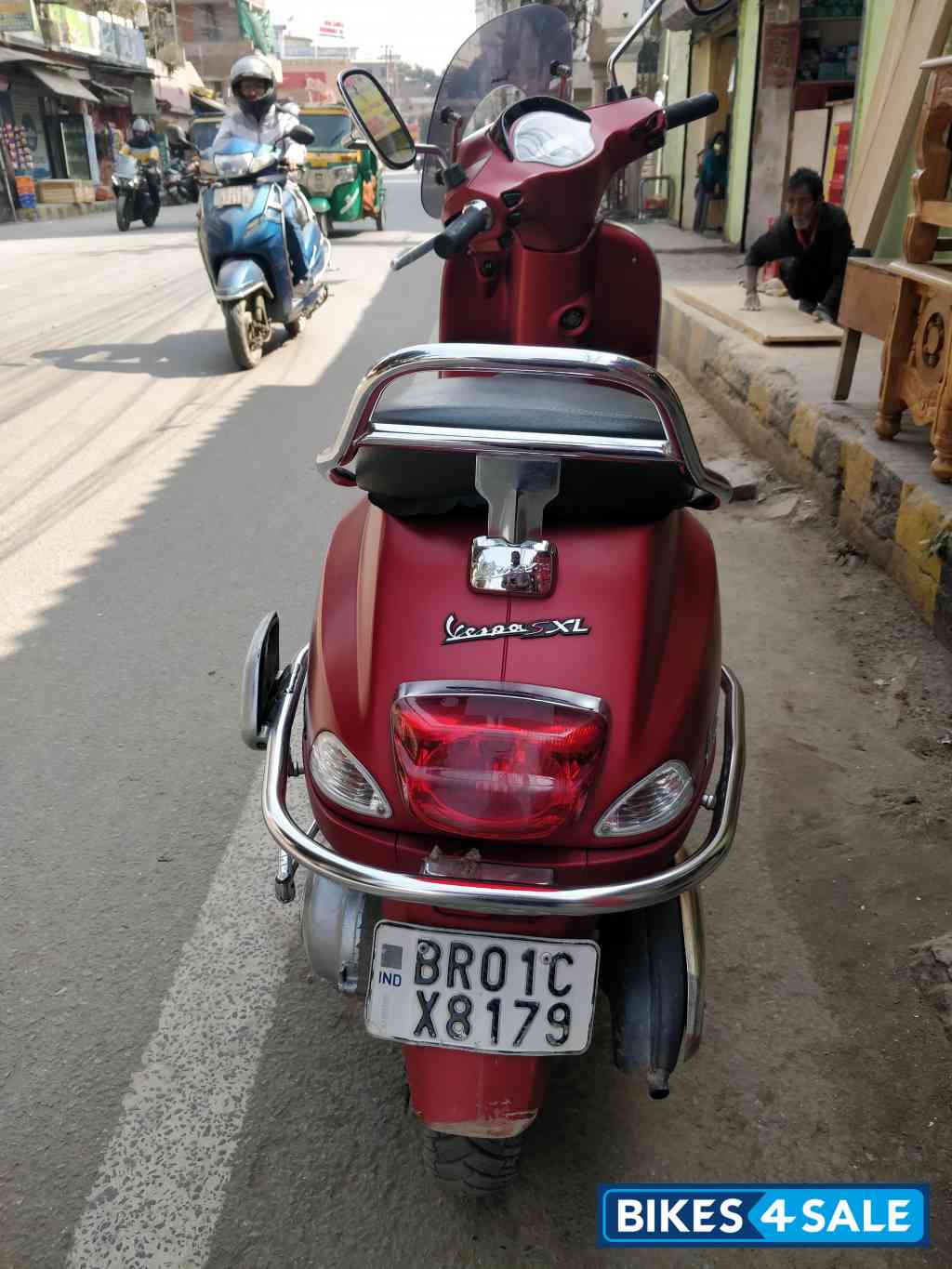 Maroon Vespa SXL 150