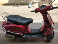 Maroon Vespa SXL 150