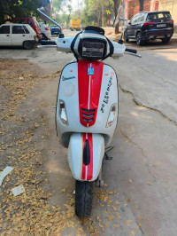 White And Red Vespa SXL 125