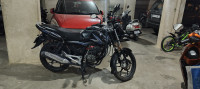 Blue And Black Bajaj Discover 100M
