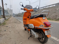 Orange Vespa SXL 125 BS6