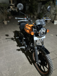 Orange Royal Enfield Thunderbird X 500