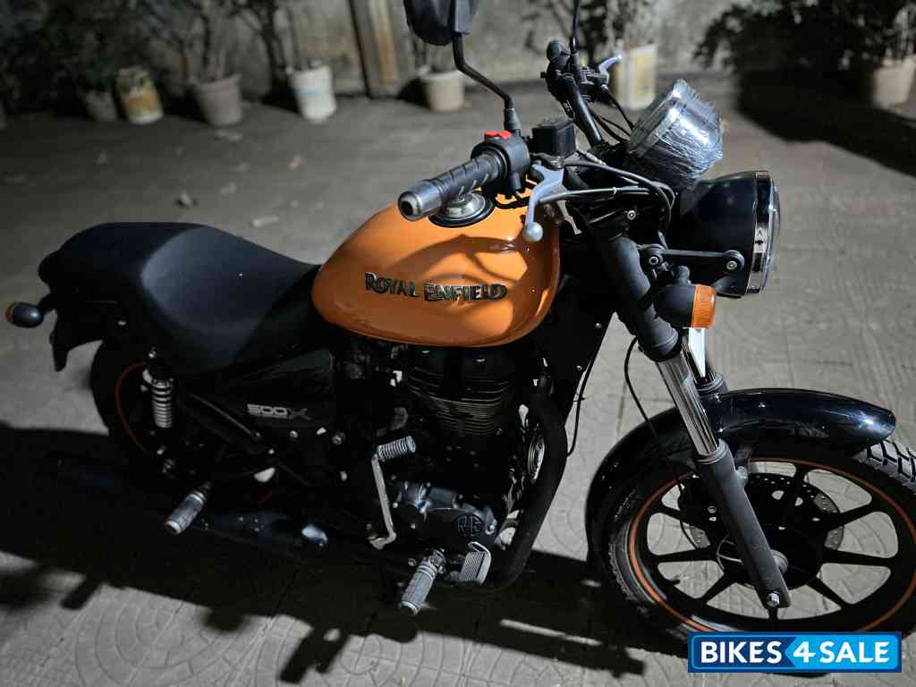 Orange Royal Enfield Thunderbird X 500
