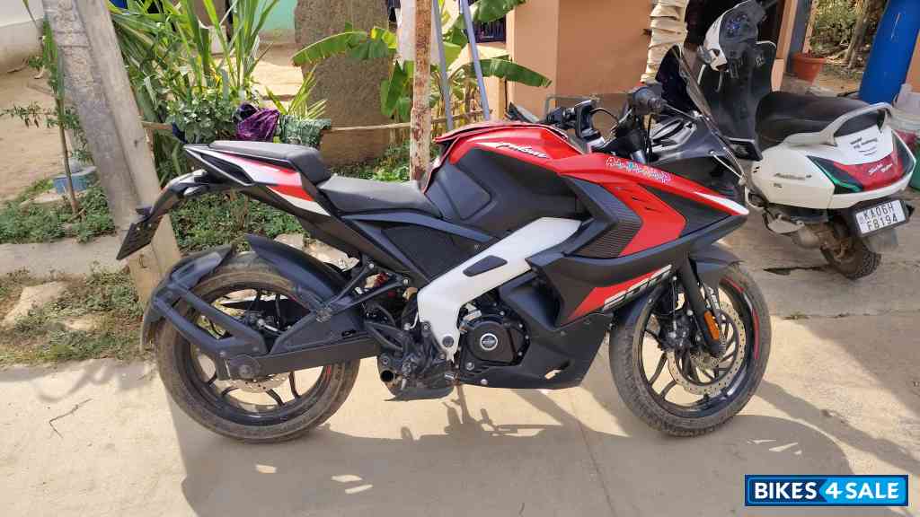 Red And White Bajaj Pulsar RS 200 ABS