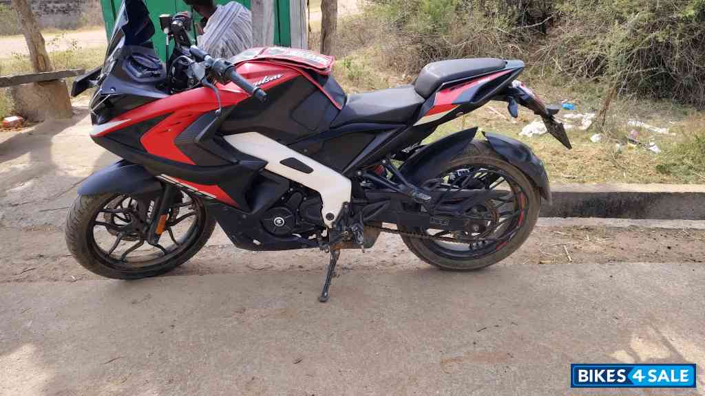 Red And White Bajaj Pulsar RS 200 ABS