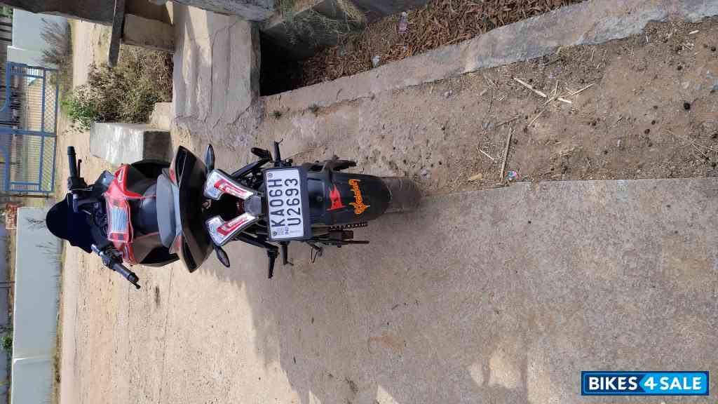 Red And White Bajaj Pulsar RS 200 ABS